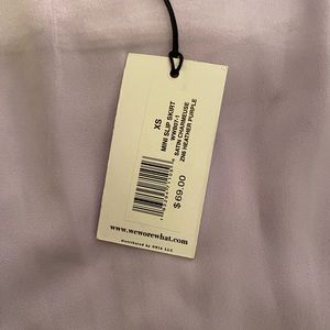 New with tags size extra small. We wore what satin charmeuse